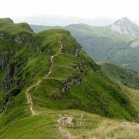 Man above Breche Roland - Walking in Cantal - Walks in France - Harder